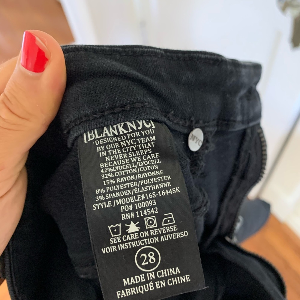 Fray hem black skinny jeans